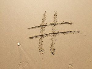 Hashtag in sand