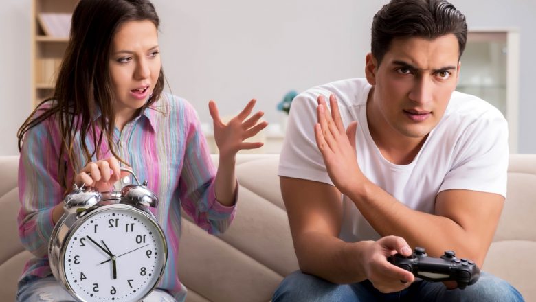 Why might you need to pay extra attention to your time/spending limits when playing games online?