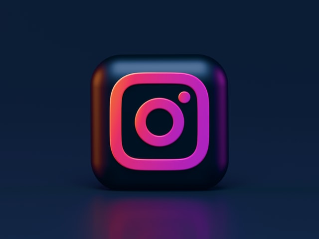 Instagram logo in vibrant pink and black colour