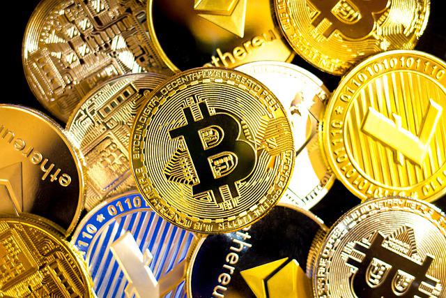 Different types of golden bitcoins placed together.