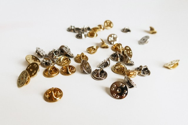 Different varieties of enamel pins.
