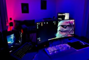A gaming studio with various computers and games.
