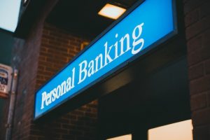 A bank with a personal banking banner.