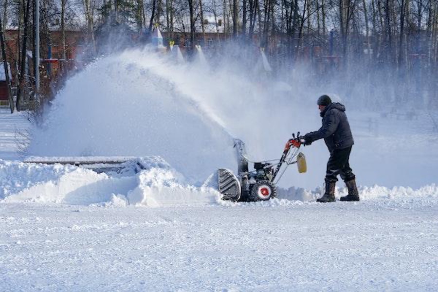 Man removing snow.